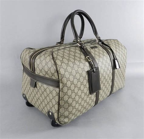 gucci travel purse|Gucci travel bag with wheels.